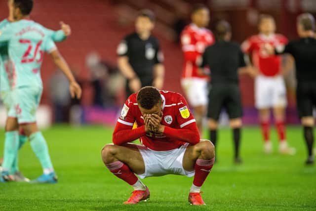 Carlton Morris shows his disappointment at full-time after Barnsley's 1-0 defeat to Swansea at Oakwell.  Picture: Bruce Rollinson.