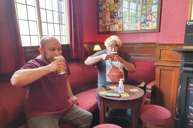 Dave Potter (left) and Tom Adams (right) were the first two customers at the Swan Pub