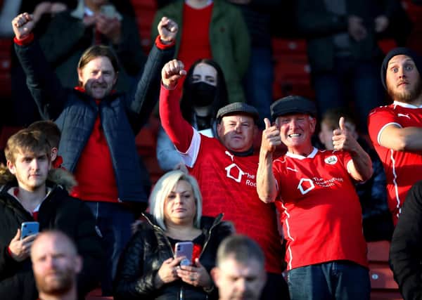 Back home: Barnsley fans in the stands. Pictures: PA