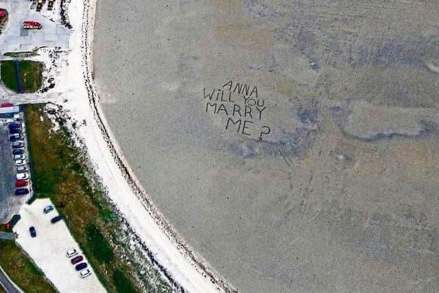 Anna saw the message on the sand from the plane. Pic: CASCADE NEWS LTD