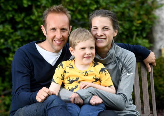 Joshua Collins who was diagnosed with Acute Lymphoblastic Leukaemia jst days after his granddad died of cancer, pictured with his mum Harriet and dad Ben at there home at Sheffield..Picture by Simon Hulme