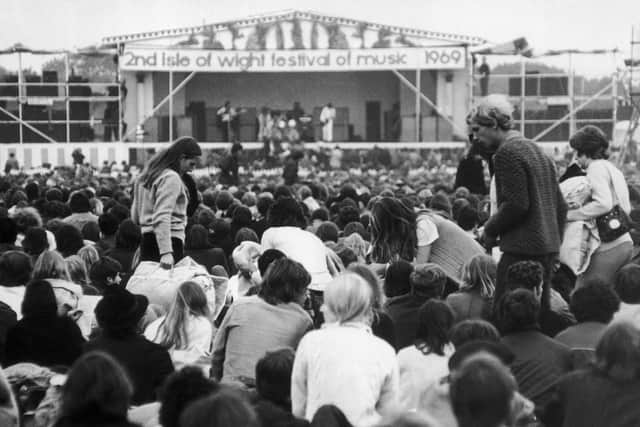 Members of the audience wait to see Bob DYLAN at the Isle of Wight music Festival in the summer of 1969. (Photo by Keystone-France/Gamma-Keystone via Getty Images)