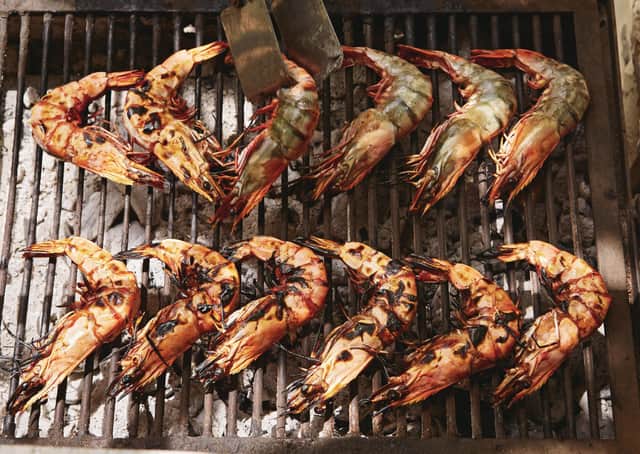 Grilled prawns from Chasing Smoke: Cooking over fire around the Levant by Sarit Packer & Itamar Srulovic Picture: Patricia Niven