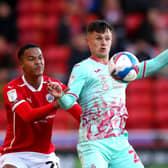 Wembley aim: Barnsley's Toby Sibbick, up against Swansea City's Liam Cullen.