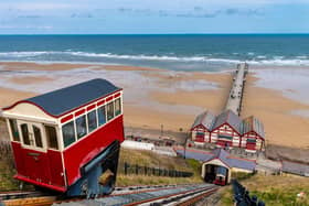 The famous Saltburn Cliff Tramway, a funicular railway system of two counterbalanced cars attached at the end of a long cable that goes from one car, up the slope, around a pulley, and back down to another car. Picture: James Hardisty.
