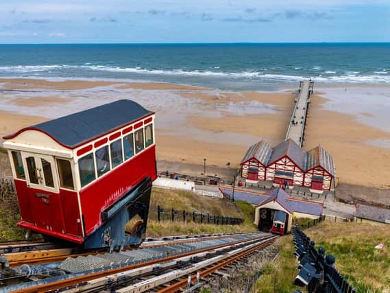 The famous Saltburn Cliff Tramway, a funicular railway system of two counterbalanced cars attached at the end of a long cable that goes from one car, up the slope, around a pulley, and back down to another car. Picture: James Hardisty.