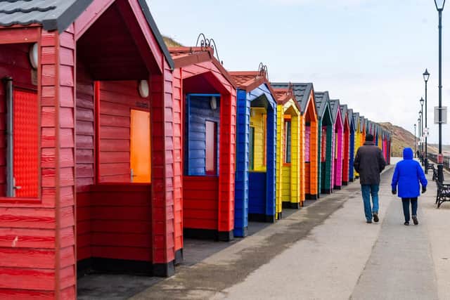 The multi-coloured Marshall's Beach Huts on the sea front in Saltburn. Picture: James Hardisty.