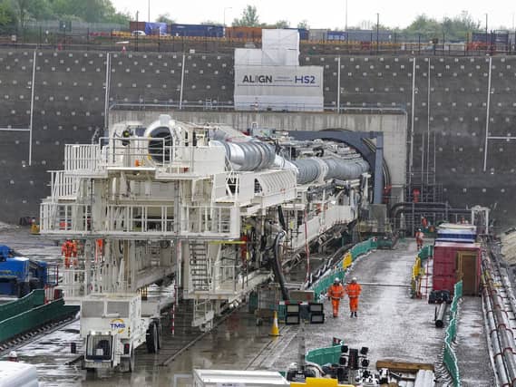 Florence - the largest ever tunnel boring machine used on a UK rail project - is unveiled at the HS2 site in West Hyde near Rickmansworth in Hertfordshire. Picture date: Thursday May 13, 2021. PA Photo. Named after nursing pioneer Florence Nightingale, The 558ft (170m) long contraption will dig a 10-mile (16km) tunnel under the Chiltern Hills, starting from a site in Buckinghamshire near the M25 motorway. Pic: PA