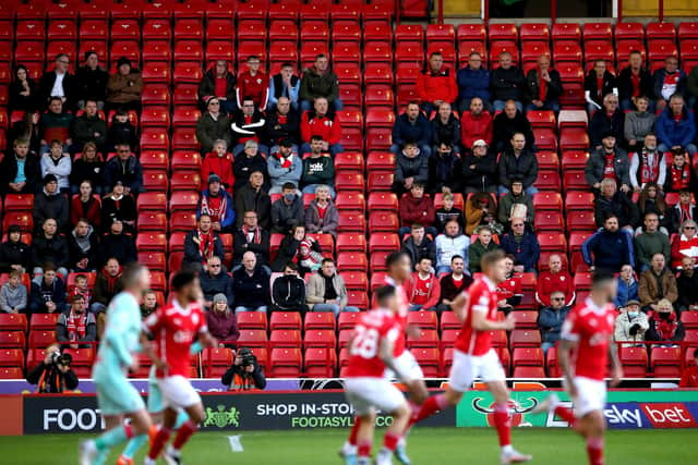 Barnsley fans make a welcome return to Oakwell. Picture: PA