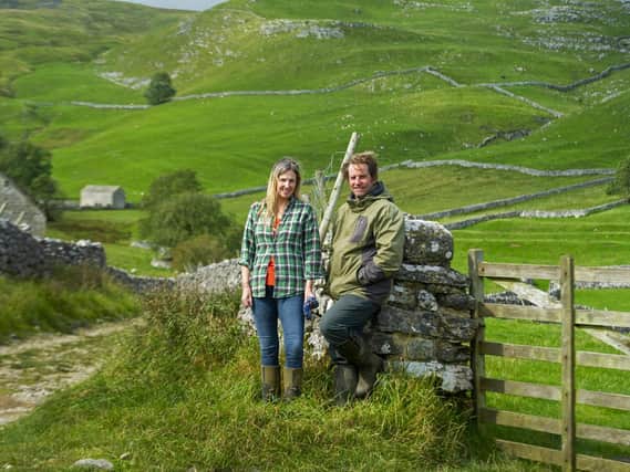 Farmers Leigh Weston and Neil Heseltine above Hill Top Farm in Malham