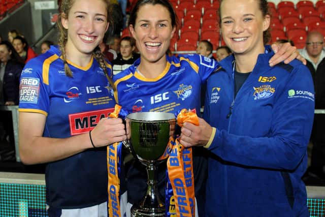 Champions: Rhinos women won the 2019 Super League Grand Final with 
Caitlin Beevers, left, Courtney Hill and Lois Forsell.