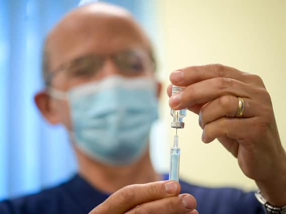 A vaccinators of the Oxford AstraZeneca COVID-19 Vaccine at the medical centre in Bridport, England. (Photo by Finnbarr Webster/Getty Images).