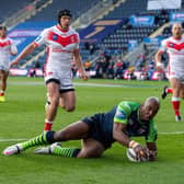 Over the line: Michael Lawrence was one of the Huddersfield try scorers in the win over Leigh.  Picture Bruce Rollinson