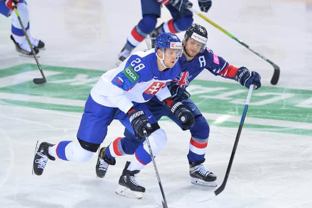 TOUGH BATTLE: GB's Rob Dowd, right, tussles with Slovakia's Martin Gernat. Picture: Dean Woolley.