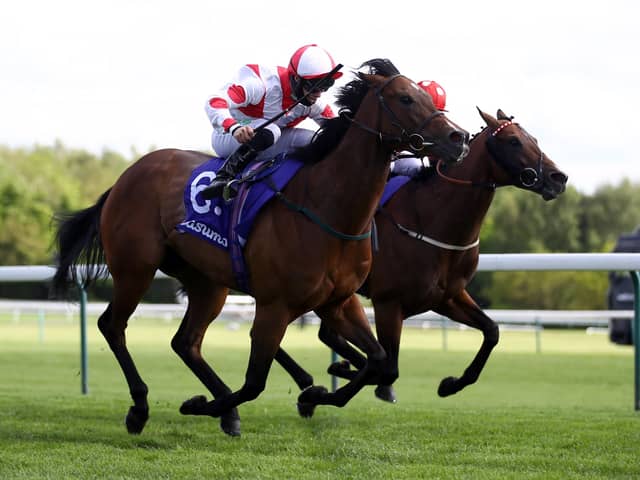 Liberty Beach ridden by jockey Jason Hart (near side) on their way to winning the Casumo Best Odds Guaranteed Temple Stakes at Haydock Park racecourse.