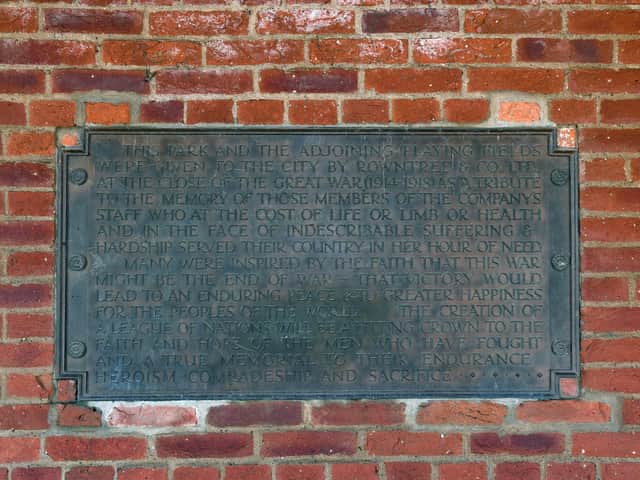 A war memorial plaque in Rowntree park