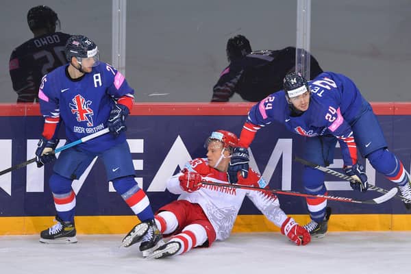 TAKE THAT: GB's Rob Dowd, left and Josh Tetlow, right, keep Denmark's Julian Jakobsen occupied. Picture: Dean Woolley.