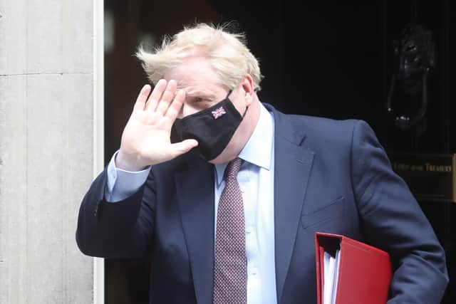 This was Boris Johnson leaving 10 Downing Street yesterday for Prime Minister's Questions.