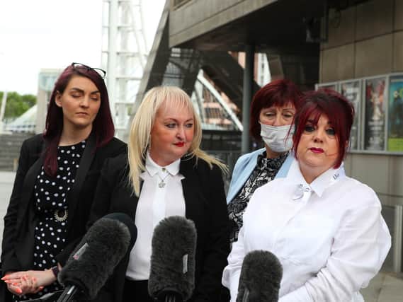 Jenny Hicks (second left) and Christine Burke (far right), relatives of victims of the Hilsborough disaster speak to the media outside the Lowry Theatre, Salford Quays, Greater Manchester