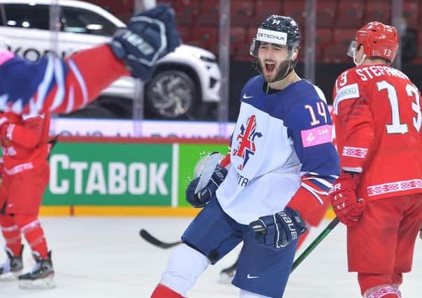DOUBLE TROUBLE: Liam Kirk celebrates his second goal against Belarus at the World Championships in Riga. Picture: Dean Woolley.