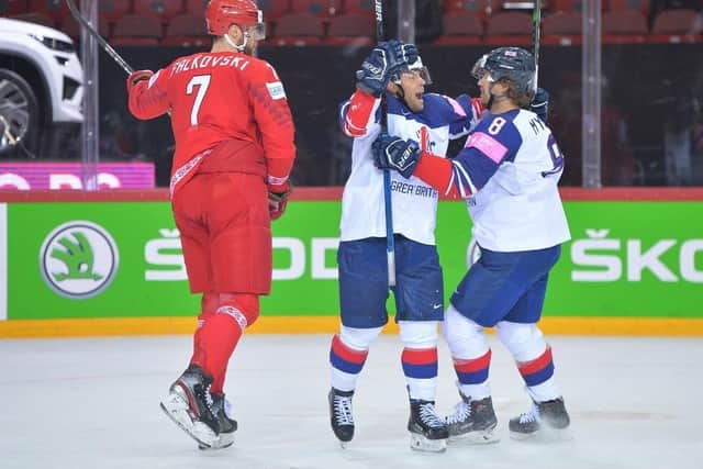 COME HERE: Ben Davies celebrates his second period strike against Belarus with Matthew Myers. Picture: Dean Woolley.