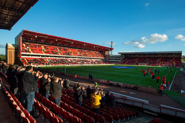 Well done: Fans back at Oakwel for
Barnsley FC v Swansea City.   Picture: Bruce Rollinson