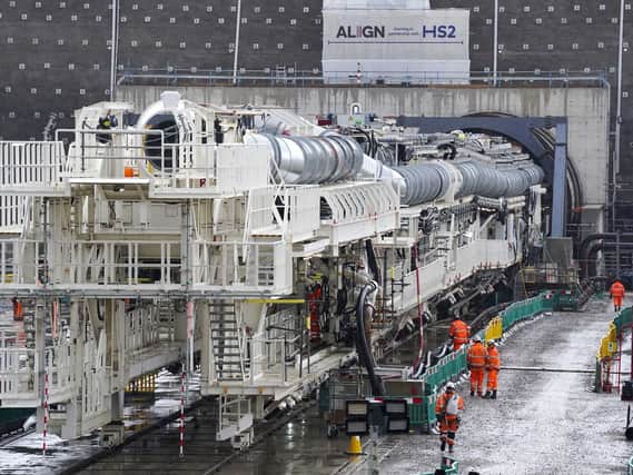 Florence - the largest ever tunnel boring machine used on a UK rail project - is unveiled at the HS2 site in West Hyde near Rickmansworth in Hertfordshire. Picture date: Thursday May 13, 2021. PA Photo. Named after nursing pioneer Florence Nightingale, The 558ft (170m) long contraption will dig a 10-mile tunnel under the Chiltern Hills, starting from a site in Buckinghamshire near the M25 motorway. See PA story RAIL HS2. Picture: Steve Parsons/PA Wire.