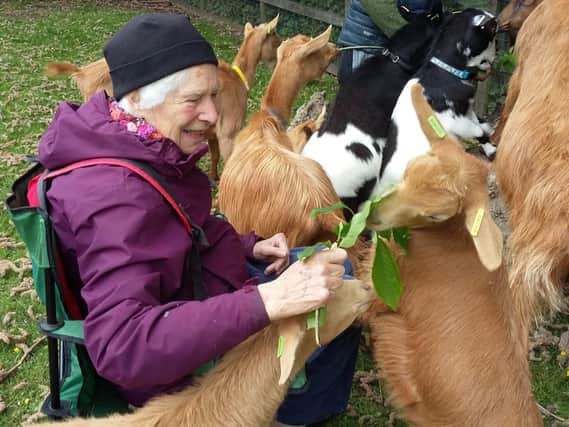 Pictured Janet Griffiths, a dementia sufferer who has benefited from animal therapy at Heeley City Farm, in Sheffield. Photo credit: Submitted picture