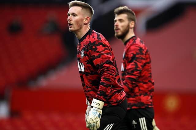 Out of the shadow: Manchester United goalkeepers Dean Henderson and David de Gea.