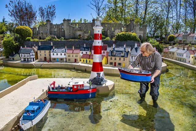 Owner Tim Whitehead positions the boats into the harbour ready for reopening to visitors this year after the easing of covid-19 restrictions at Bondville Model Village in Sewerby, Bridlington. Picture Tony Johnson