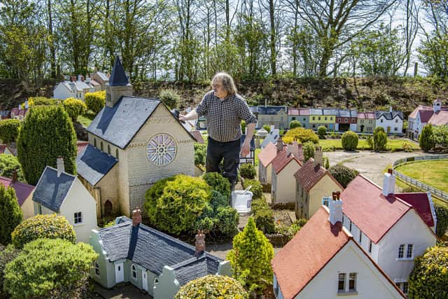 Owner Tim Whitehead scrubs up the buildings ready for reopening to visitors this year after the easing of covid-19 restrictions at Bondville Model Village in Sewerby, Bridlington. Picture Tony Johnson