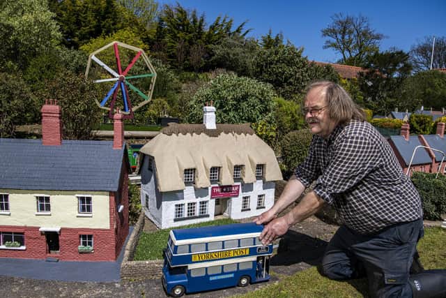 Owner Tim Whitehead positions the Yorkshire Post bus ready for reopening to visitors this year after the easing of covid-19 restrictions at Bondville Model Village in Sewerby, Bridlington. Picture Tony Johnson