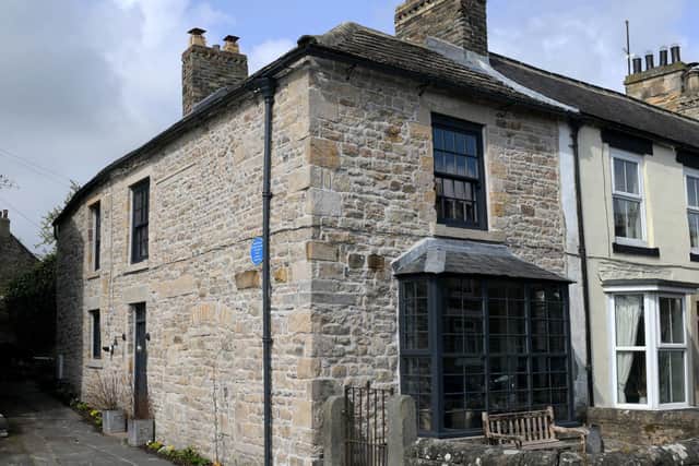 The cottage has been stripped of its peeling white paint and taken back to the original stone