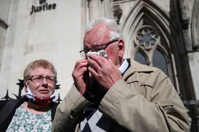 Former post office worker Noel Thomas, who was convicted of false accounting in 2006, celebrates with his daughter Sian outside the Royal Courts of Justice, London, after having his conviction overturned by the Court of Appeal.  Picture: Yui Mok/PA Wire