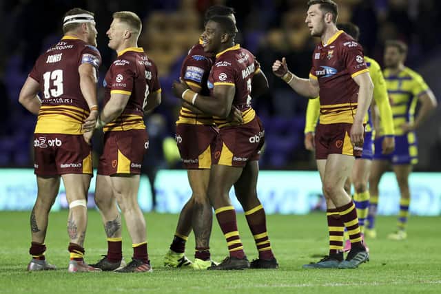 Togetherness: Huddersfield Giants have won three games on the trot and are aiming for four against Wakefield. Picture by Paul Currie/SWpix.com