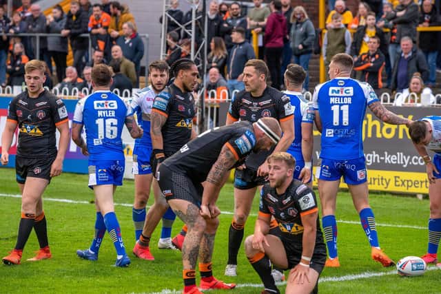 Castleford Tigers players are beaten again in the first half. (BRUCE ROLLINSON)