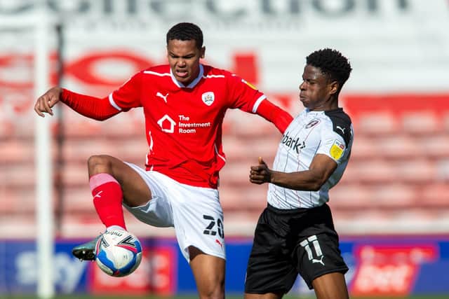 Chiedozie Ogbene, right, in action for Rotherham against Barnsley, last month (Picture: Bruce Rollinson)