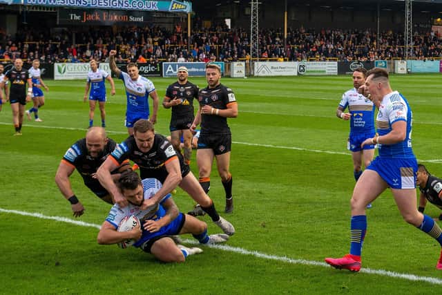 Tom Briscoe scores the Rhinos first try in the rout of 
Castleford Tigers (Picture: Bruce Rollinson)