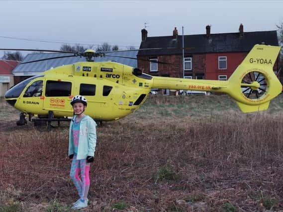 Kind-hearted Julia Zbik felt too shy to approach paramedics to say "thank you" after spotting them land in a field in Barnsley, so raised money for them instead