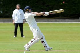 Big hit: Woodlands opener Sam Frankland hits a six in his innings of 42 during the Bradford League leaders 144-run victory over Wrenthorpe. Picture: Steve Riding