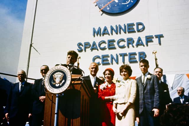 Astronaut John Glenn, Jr. is honoured by President John F. Kennedy after his historical first manned orbital flight, Mercury-Atlas 6.