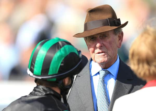 A horse named after the late trainer John Dunlop (pictured) is one of the leading contenders for the Cazoo Derby.