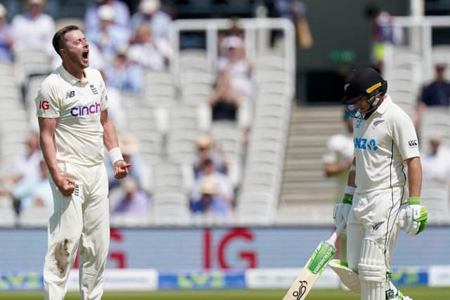 Got him: England's Ollie Robinson celebrates taking the wicket of New Zealand's Tom Latham.