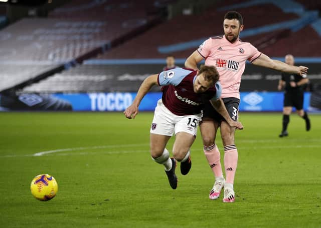 No penalty: VAR ruled out a penalty call for Sheffield United's Enda Stevens's challenge on West Ham United's Craig Dawson.