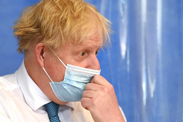 Boris Johnson's handling of the Covid pandemic continues to divide political and public opinion.