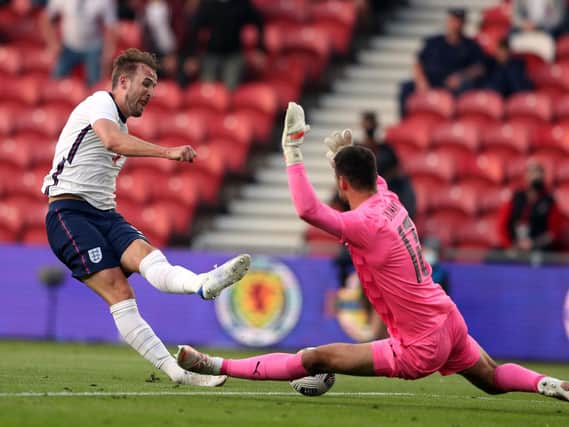 England captain Harry Kane is denied by Austrian keeper Daniel Bachmann in the first half of the Three Lions' friendly against Austria at Middlesbrough. Picture: PA.