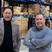 Trading places: (Left to right) Ivan Zhou and Martin Doyle at textiles firm, Pegasus World