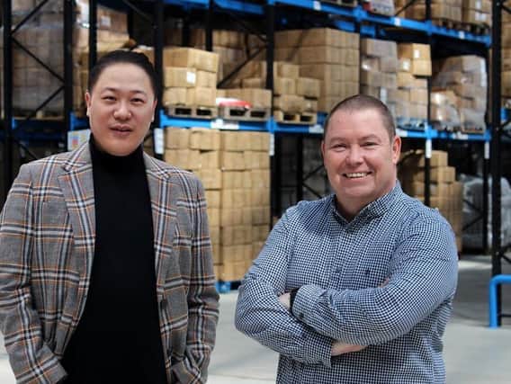 Trading places: (Left to right) Ivan Zhou and Martin Doyle at textiles firm, Pegasus World