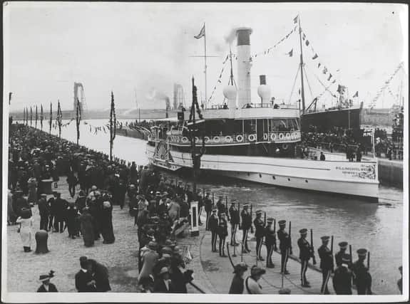 The 'Killingholme' entering the docks with the King and Queen aboard, as the King arrives to perform the opening ceremony of Immingham Dock, Grimsby, England, 22nd July 1912. (Photo by Topical Press Agency/Hulton Archive/Getty Images)
