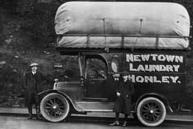 circa 1925:  A mobile laundrette operating in Newtown, Honley, provides a shirt and collar dressing service as well as dyeing and dry-cleaning for West Riding and Yorkshire.  (Photo by Chaloner Woods/Getty Images)